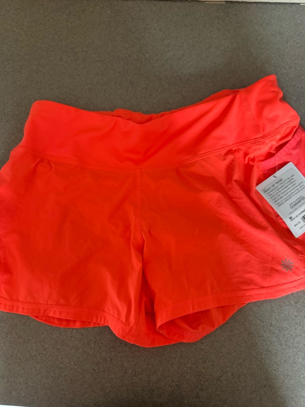 Athleta Bright Coral Athletic Shorts nwt size medium